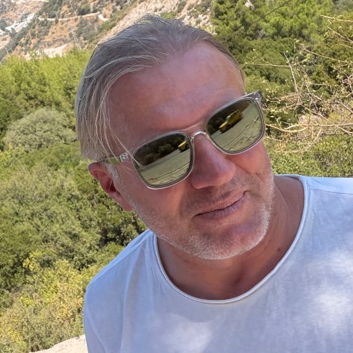 TANER TUNA